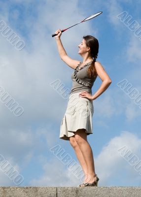 woman playing badminton