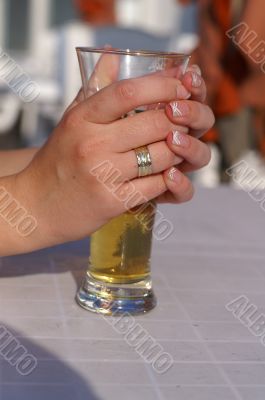 a woman drinking beer