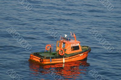 Security boat on a port