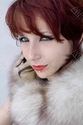 Portrait of a girl in fur