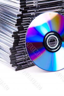 Corner of a stack of CD-boxes with 1 CD