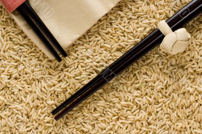 Brown rice and chopsticks