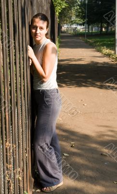 woman near a fence