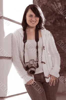 Girl with SLR photo camera