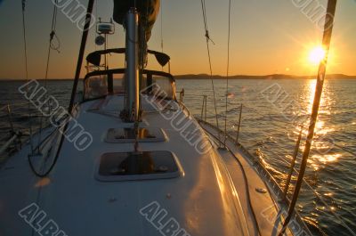 sailing away from the sunset