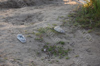 shoes left on the sand