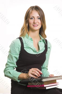 The girl with books on a white background