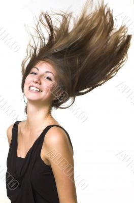 The beautiful girl with fluttering hair