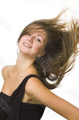 The beautiful girl with fluttering hair