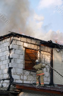 firefighter extinguish a fire