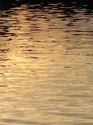 reflection of sun on the water surface