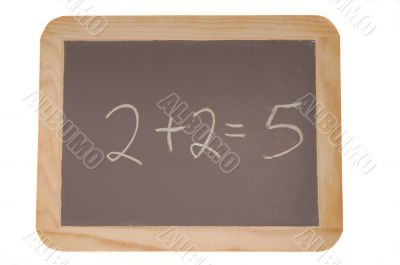Chalkboard with 2+2 equals 5 written on it