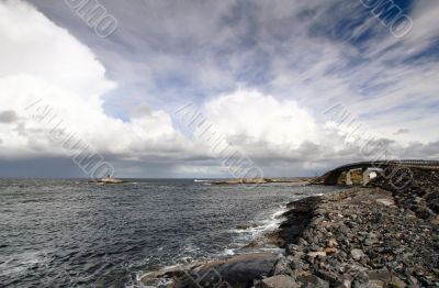 ocean and island with bridge