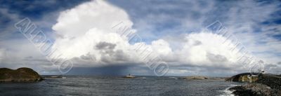 ocean and island with bridge