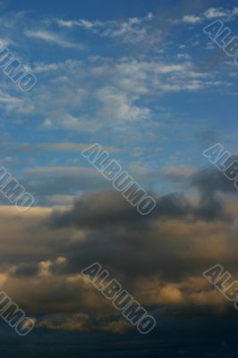 Blue sky / dark clouds