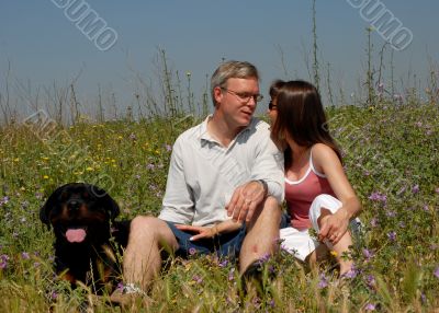 couple and dog