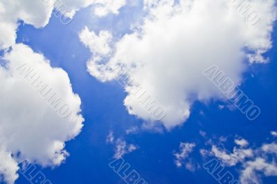 bright blue sky with fluffy white clouds
