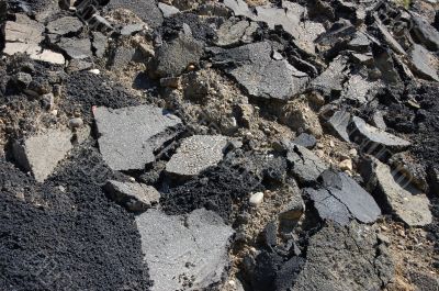 broken asphalt and debris