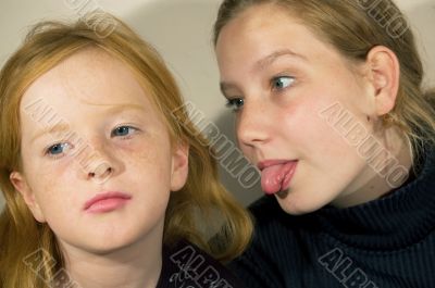 two girls sitting together