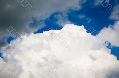 huge white fluffy clouds in a blue sky