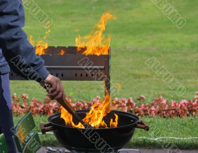 Barbecue grills and flame