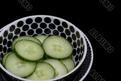 Cucumber in slices.