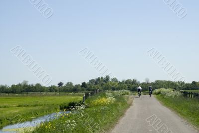 landscape with couple on the bike