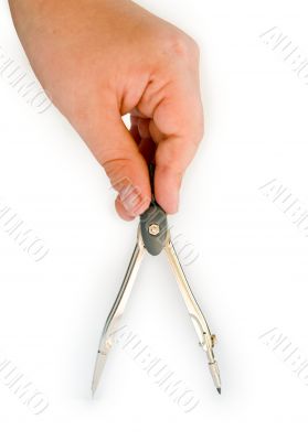 hand with compasses