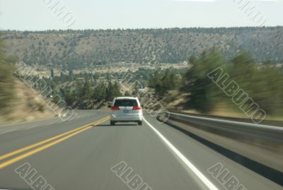 Traffic blur, white car