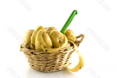 potatoes to peel in a basket