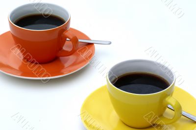 Two cups of coffee.