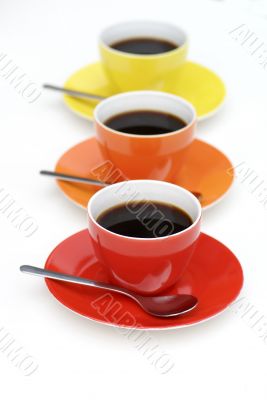 Cups of coffee  standing in line.