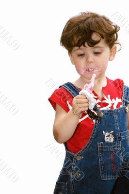 little girl is eating strawberry ice-cream