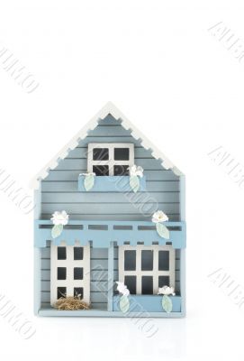 Blue house with white flowers