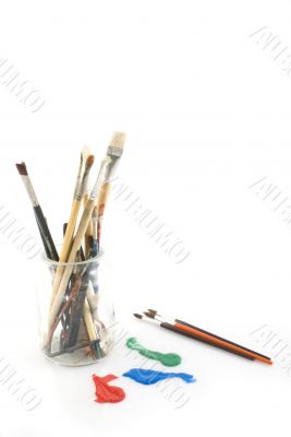 glass with old pencils and brushes
