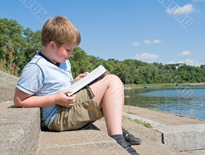 boy reads book