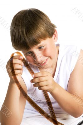 Boy is studying celluloid