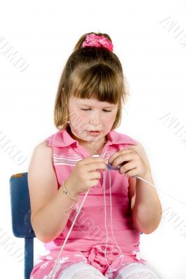 girl is knitting
