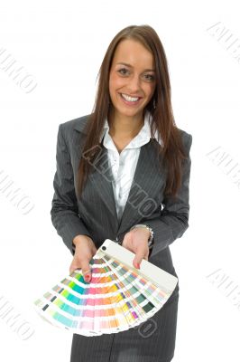 Business woman demonstrates palette of the paints