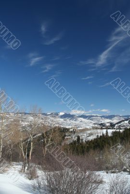 High cirrus in blue sky