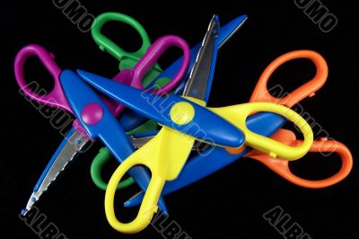 Colorful Scissors on Black Background