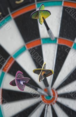 Three darts in the dartboard