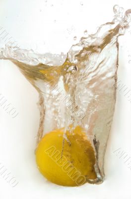 Lemon submitting to water with sparks