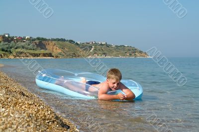 boy in an inflatable boat