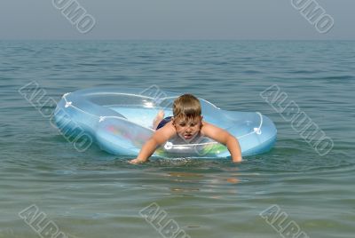 boy in an inflatable boat