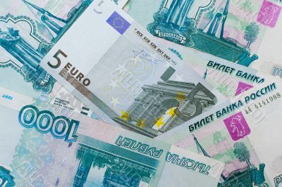 Euros and Russian roubles banknotes