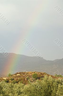 Rainbow in blue sky of greece