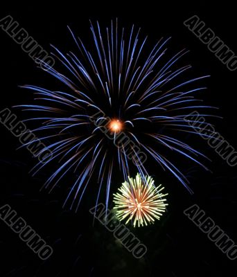 Night fireworks upon dark sky