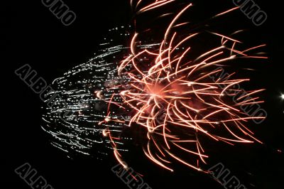 Night fireworks upon dark sky