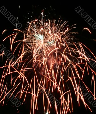 Night fireworks upon dark sky